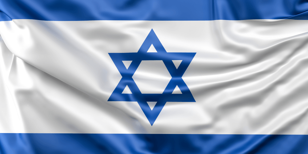 National flag of Israel displayed against a clear sky